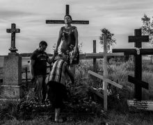 Whisperer Anna enters a young woman into a trance on the special stone where Holy Mary was seen by two small girls sixty years ago. Anna heals this woman from infertility while her husband holds her hand and prays.