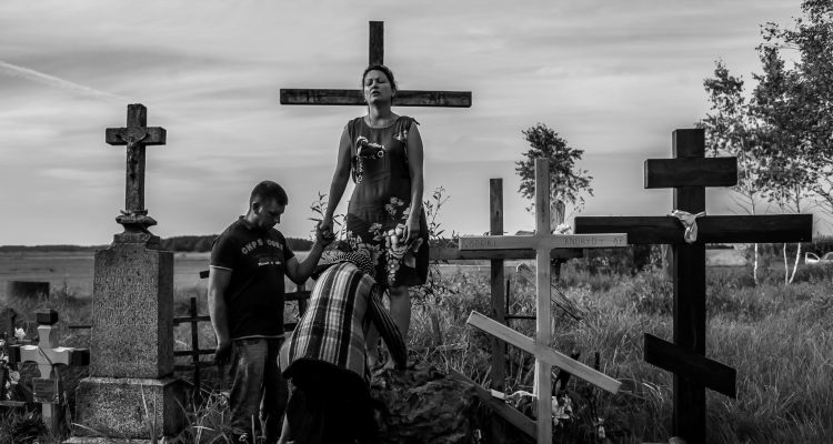 Whisperer Anna enters a young woman into a trance on the special stone where Holy Mary was seen by two small girls sixty years ago. Anna heals this woman from infertility while her husband holds her hand and prays.